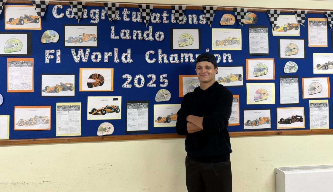 Norris visits old school